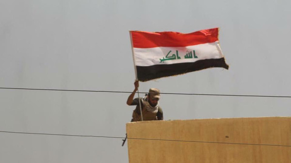 بالصور.. رفع علم العراق في آخر معاقل داعش بصلاح الدين