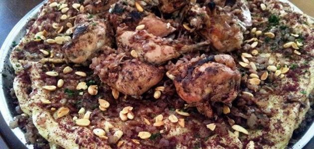 شاهدِ بالفيديو: إعداد أكلة "المسخن" التراثية الفلسطينية