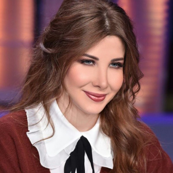 بالصور: الفنانة اللبنانية "نانسي عجرم" تعود إلى ممارسة حياتها بسعادة وعفوية