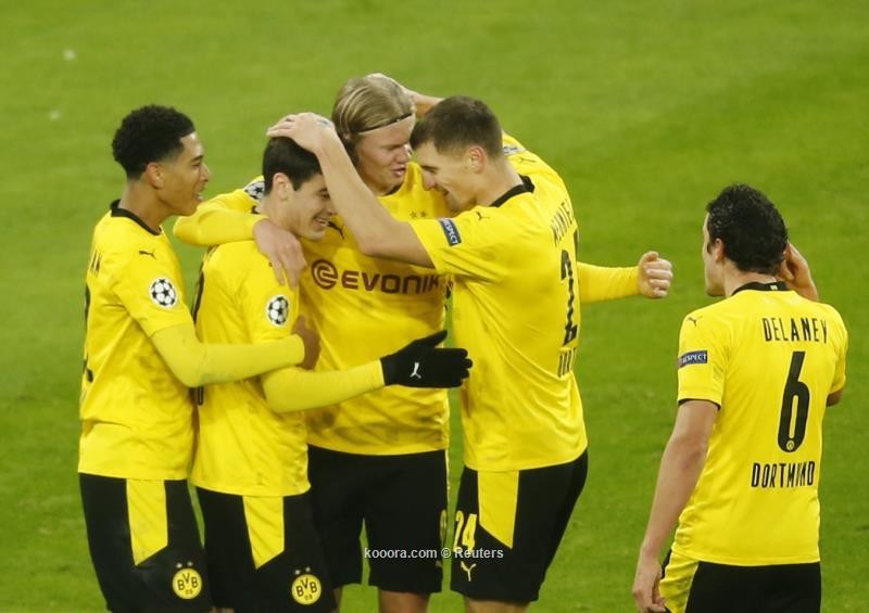 بالصور : هالاند يقود فريقه دورتموند للفوز على كلوب البلجيكي بثلاثية