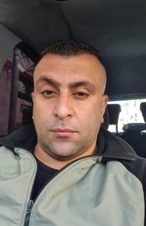 الاحتلال يزيل يافطة تحمل صورة الشهيد المقدسي نور شقير