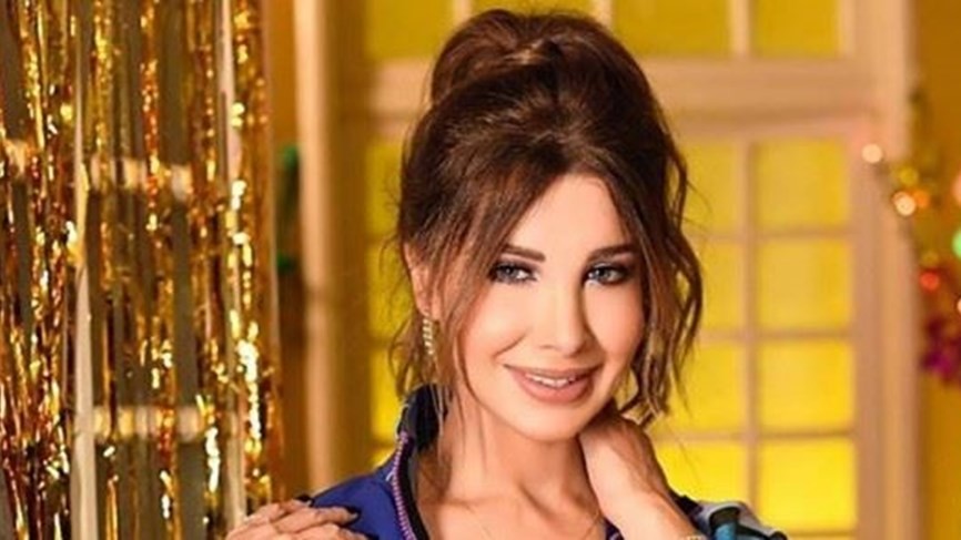 بالفيديو |  النجمة اللبنانية  "نانسي عجرم" تكسر الملل وترقص أمام فرقتها الموسيقية