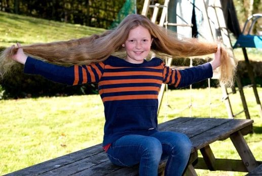 طفل بريطانى يمتنع عن حلاقة شعره لمدة 8 سنوات لهدف نبيل!