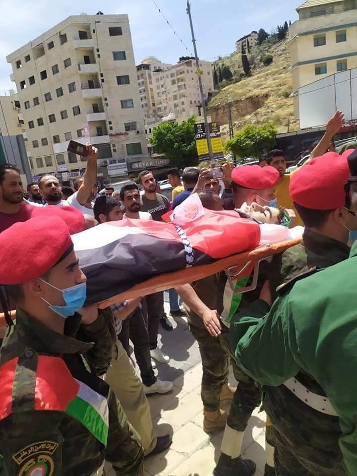 أهالي بلدة بيتا بنابلس يُشيعون جثمان الشهيد زكريا حمايل