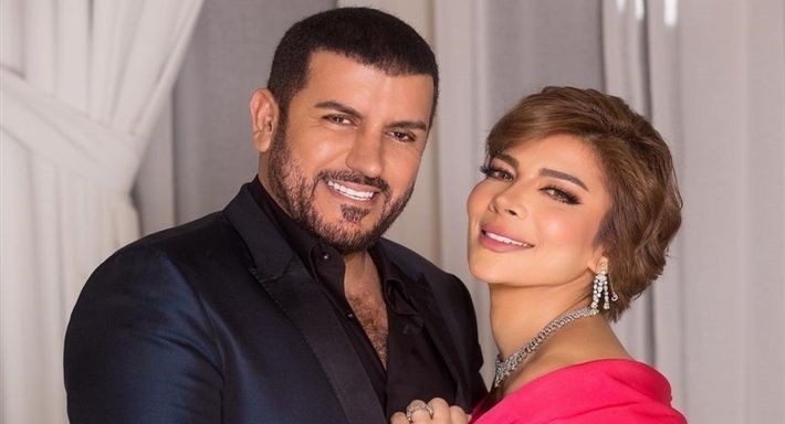 أصالة وزوجها يتجاهلان اتهامات طليقته بالتعدي على منزلها بوصلة غزل بينهما