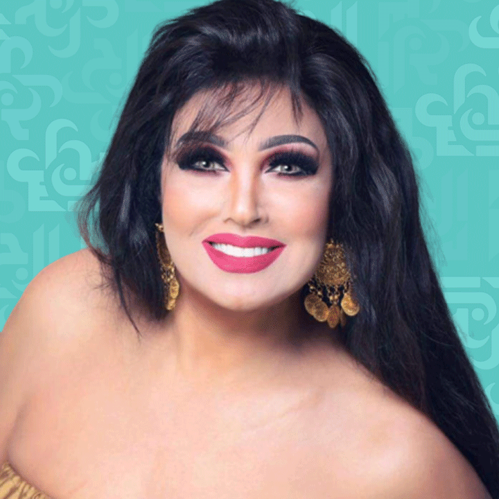 فيفي عبده بالحجاب من أمام البحر وتسبح بالعباءة