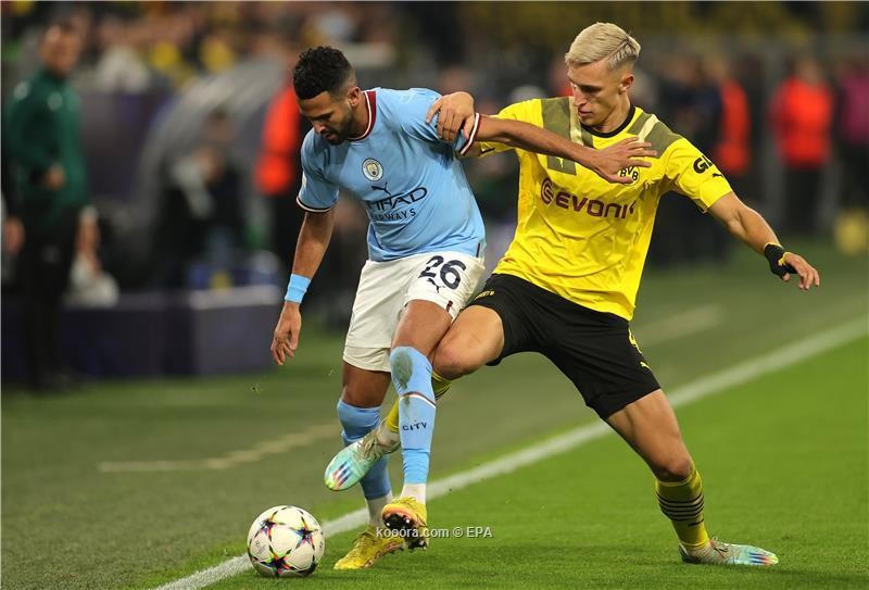 بالصور : دورتموند يحسم التأهل بالتعادل مع مانشستر سيتي