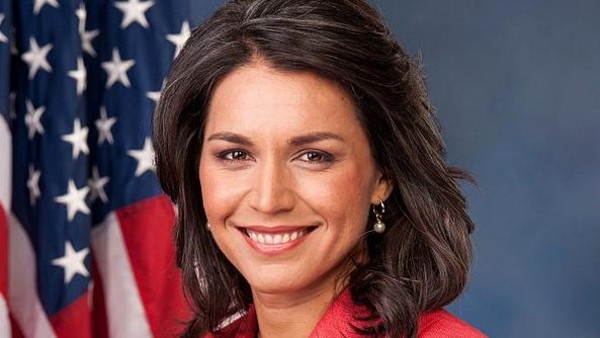 ماذا تفعل عضوة الكونغرس في دمشق؟