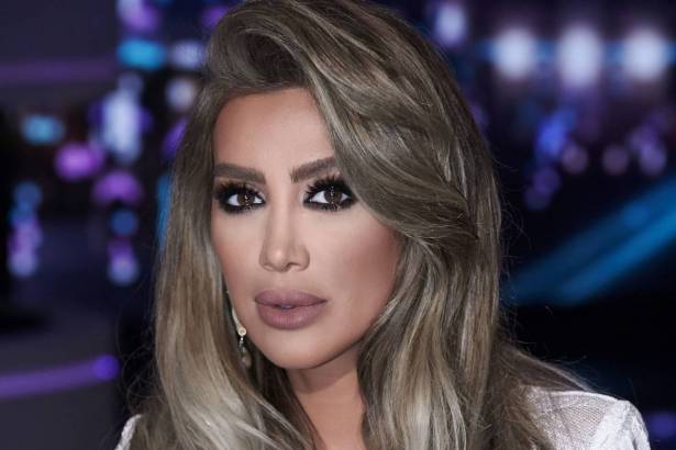 بهاتين الصورتين سخرت "عديلة" من إطلالة مايا دياب