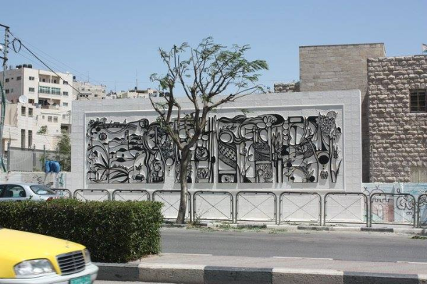 جدارية "الحلم الفلسطيني" في دورا تجسد التاريخ الفلسطيني