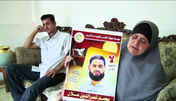 والد علان: اسرائيل تتكتم على وضعه واخشى اطعامه قسريا