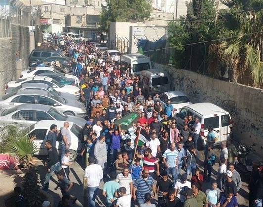 وصول جثمان الشهيد صلاح الى مخيم شعفاط