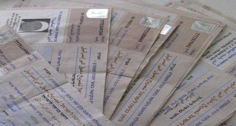 "وتزوير تصاريح عمال"