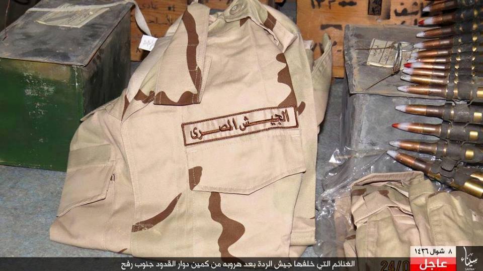 بالصور : ولاية سيناء تدمر و تستولي على معدات للجيش المصري جنوب رفح