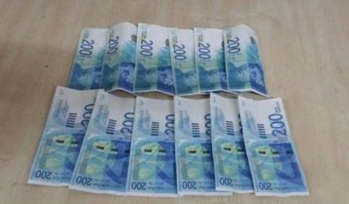 ضبط مختبر لتزوير العملات والقبض على أصحابه بطولكرم
