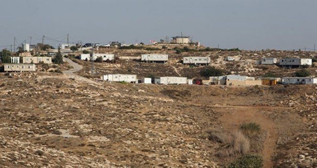 وقفة في رام الله احتجاجًا على مصادرة أراضي أم صفافا وجيبيا وبرهام