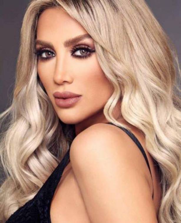 صورة: مايا دياب بفستان ممزق من الامام والوراء