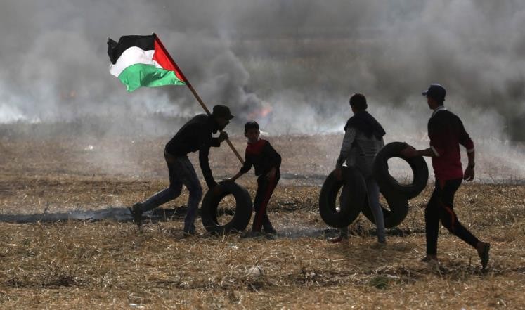 آلاف الفلسطينيين يستعدون للزحف على حدود قطاع غزة