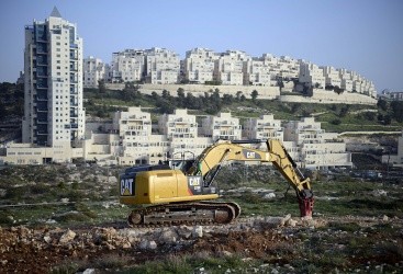 تقرير: الصمت الدولي يشكل غطاءً وتشجيعاً للاحتلال على مواصلة الاستيطان
