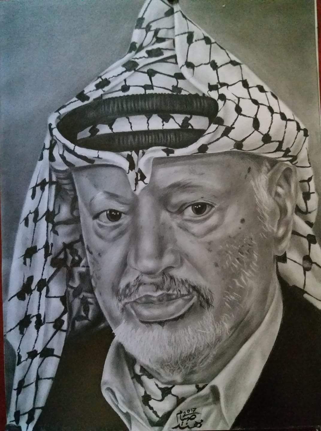 بالفيديو: جدران غزّة تستعيد صور أبو عمار مع قرب ذكرى استشهاده الـ16