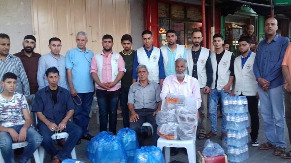 بالصور: حركة فتح بساحة غزة تنظم حملة افطار الصائم 