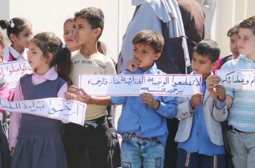 وقفة احتجاجية على قطع مساعدات "CHF" بغزة