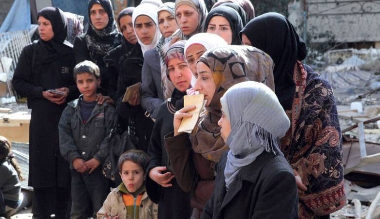 اعتقال فلسطينية أثناء خروجها من مخيم اليرموك