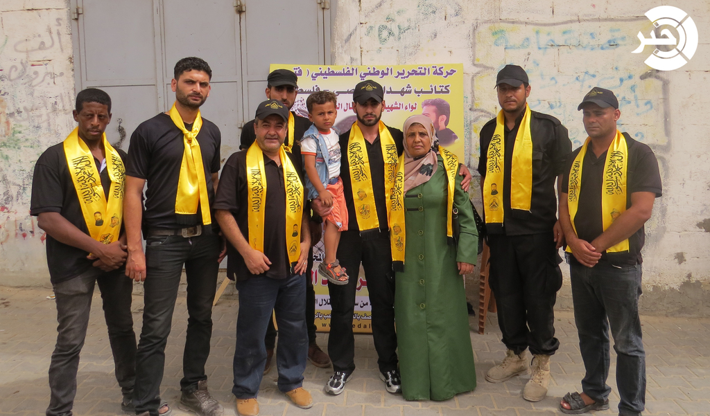 بالصور : الجناح العسكري لفتح يستقبل الأسير "عبد النبي"