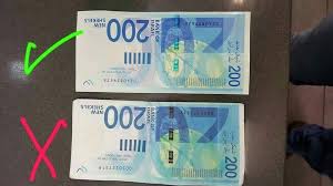 شرطة الاحتلال تعتقل شابين من الجليل بتهمة تزوير أوراق نقدية