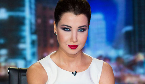 نانسي عجرم تتجاهل اتهام محمد رحيم لها بسرقة لحن "مقسومة نصين "