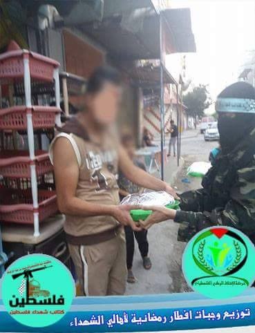 الإئتلاف الوطني وجناحه العسكري يوزعان وجبات إفطار لعوائل الشهداء 