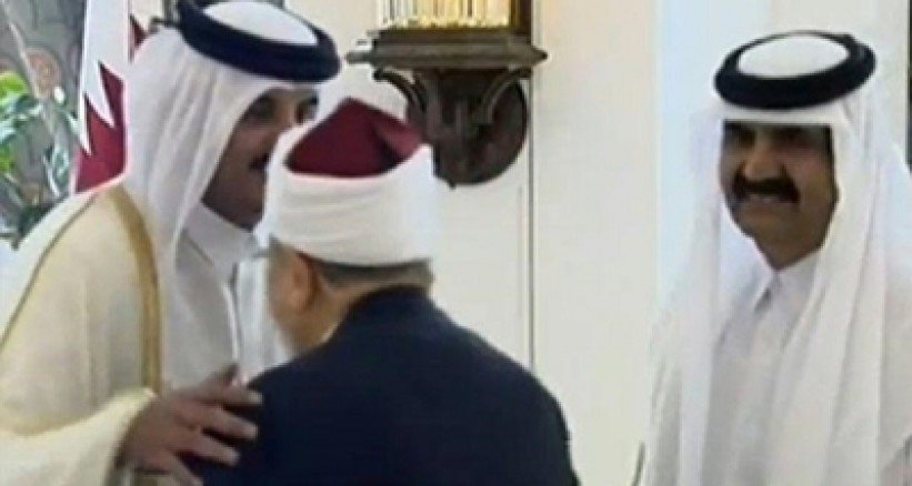 أمير قطر يستقبل القرضاوي