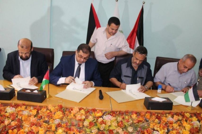 مذكرة تفاهم لتخفيض التأمين الصحي لعمال وخريجي غزة