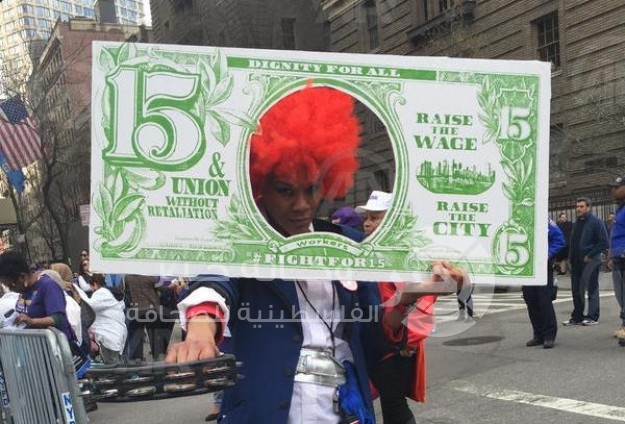 أمريكا تشهد مظاهرات تحت شعار "النضال من أجل 15 دولار ."