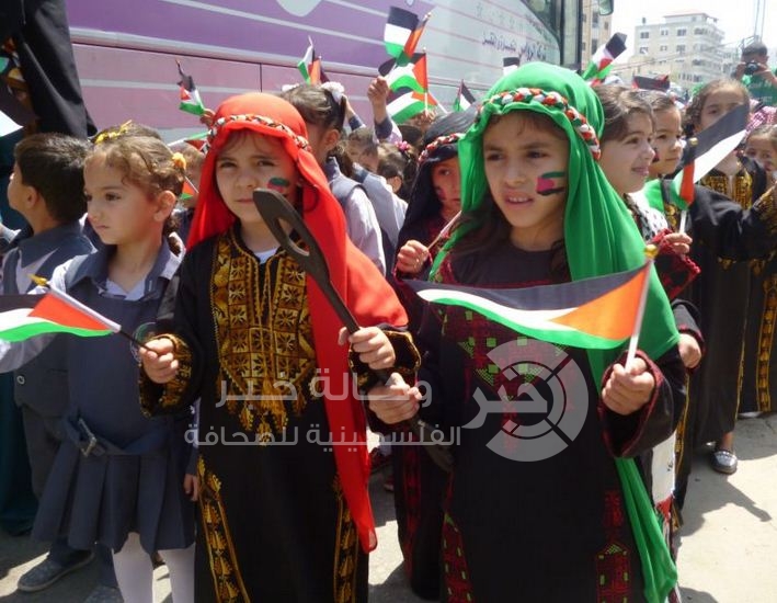 بالصور : مسيرة لأطفال غزة صوب مقر الأمم المتحدة بذكرى النكبة