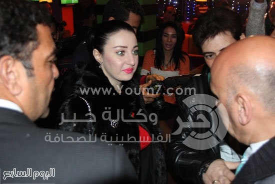 بالصور.‏..صافيناز‬ خلال مؤتمر لكشف حقيقة اتهامها بإهانة علم مصر